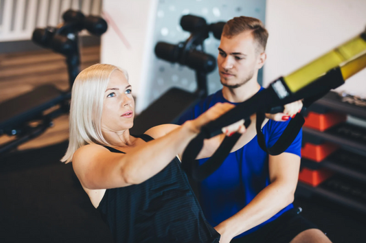 How Personal Trainers Can Keep Client Momentum Going (and Overcome Fitness Plateaus)